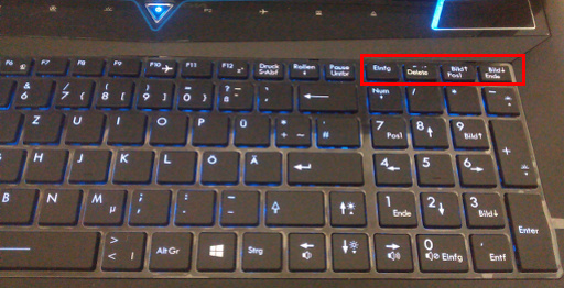 Photo of Erazer's keyboard, with the four mentioned keys in the top right corner, above the numpad.
